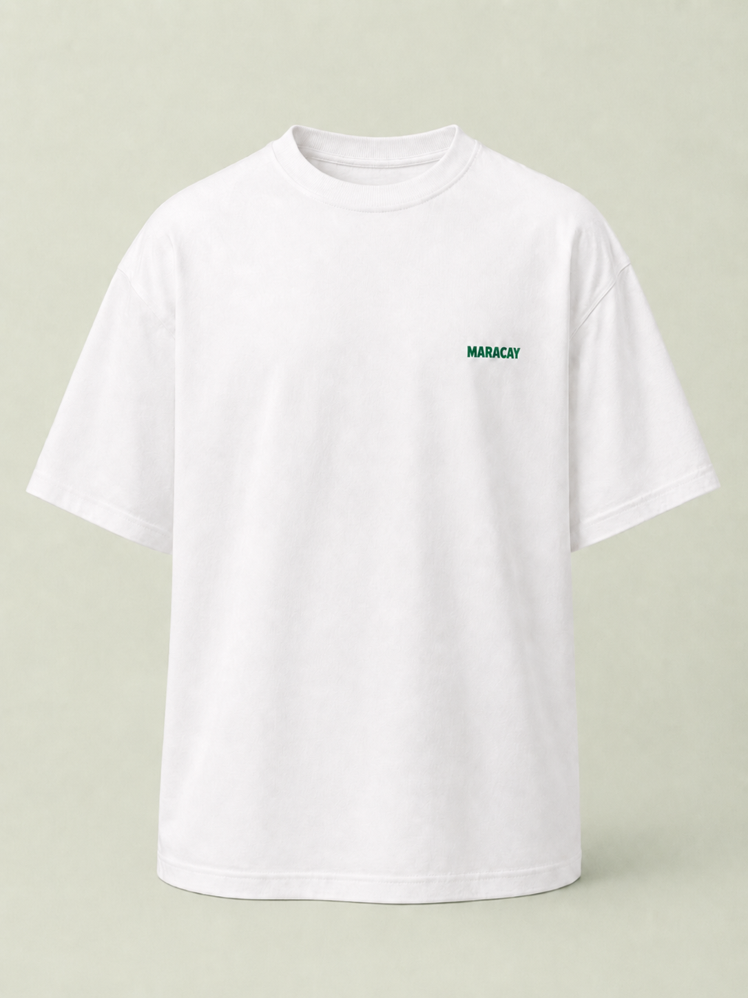 White t-shirt with a green logo on a light gray background