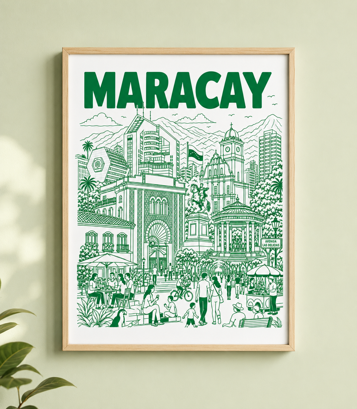 Framed artwork of a cityscape with 'MARACAY' at the top on a light green wall.
